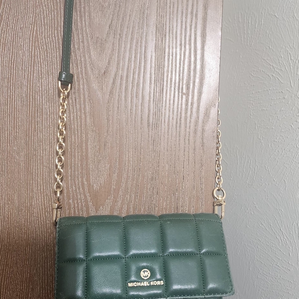 A very unique mini size quilted michael kirs bag.